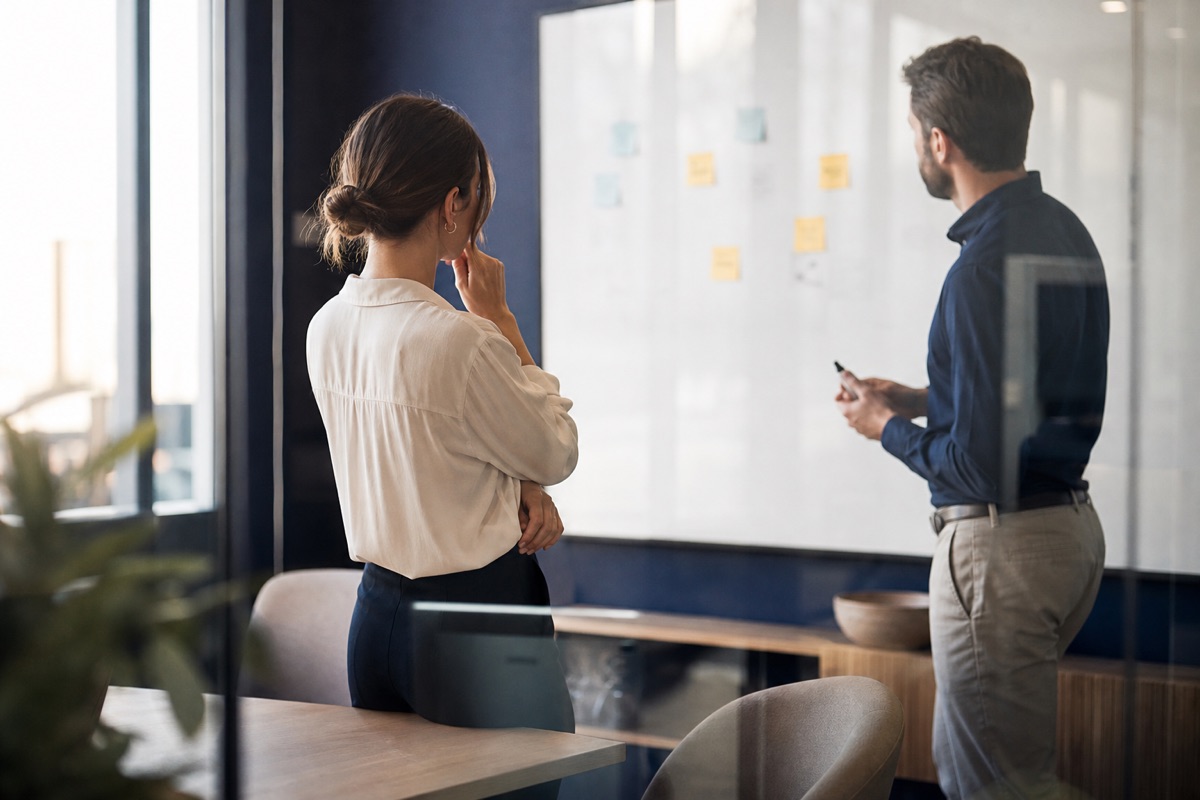 Consultants in a minimal meeting room